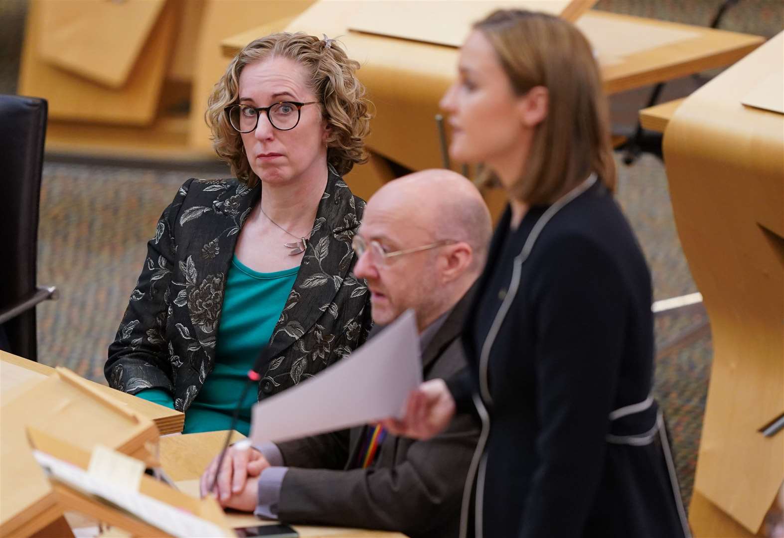 Patrick Harvie (centre) and Lorna Slater (left) were beside Net Zero Secretary Mairi McAllan when she announced the Scottish Government was ditching the emissions target (Andrew Milligan/PA)