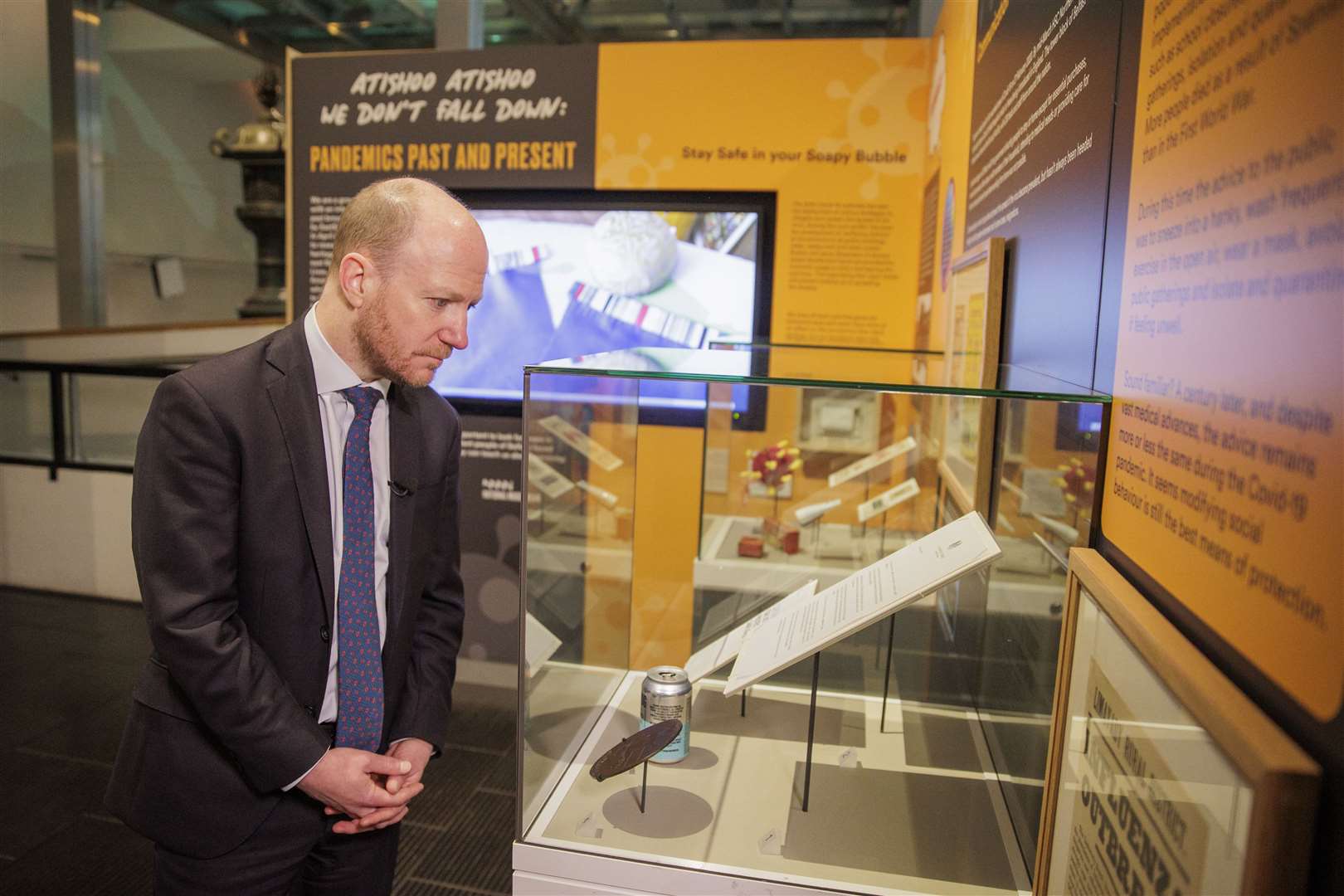 Ben Connah, secretary to the UK Covid-19 Inquiry at EastSide Partnership’s exhibition, Atishoo Atishoo We Don’t Fall Down: Pandemics Past and Present, at the Ulster Museum (Liam McBurney/PA)