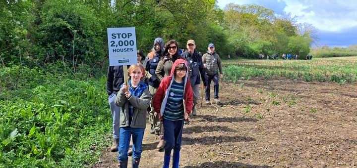 More than a hundred turned out to march against proposals for 2,000 homes outside Canterbury. Pics courtesy of Save the Blean campaign group