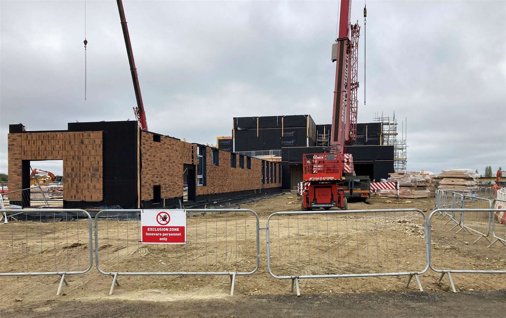 The new buildings are taking shape just off the A28 Ashford Road. Picture: Bowmer + Kirkland